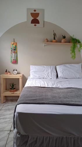 Ένα ή περισσότερα κρεβάτια σε δωμάτιο στο Quarto Privativo Tematico - Aracaju