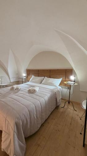 Postel nebo postele na pokoji v ubytování Xenia Boutique Apartment