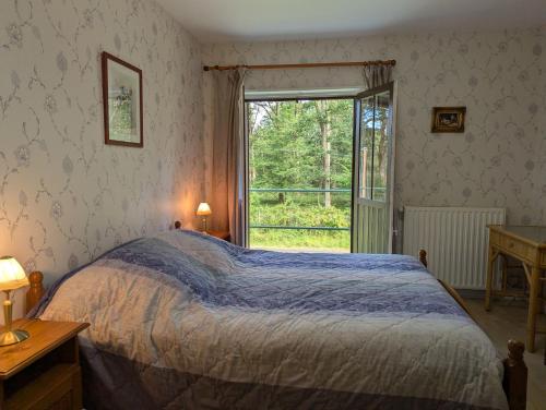 Ένα ή περισσότερα κρεβάτια σε δωμάτιο στο Chambre d'hôtes "Perle", Communs de Bon Hôtel