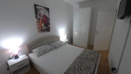 Ένα ή περισσότερα κρεβάτια σε δωμάτιο στο Fimiso