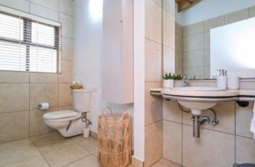 Et badeværelse på Oubaai golf eatate