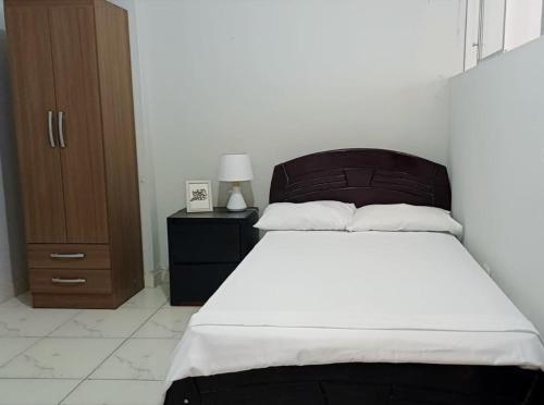 En eller flere senge i et værelse på Casa Estancia Jaén