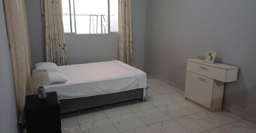 En eller flere senge i et værelse på Casa Estancia Jaén