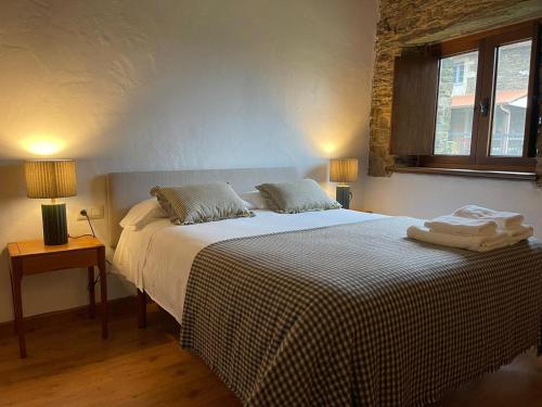 Postel nebo postele na pokoji v ubytování Casas do Campo