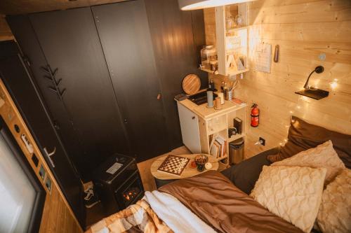 Ένα ή περισσότερα κρεβάτια σε δωμάτιο στο Homnest - Confins des Domes - Volvic & Vulcania