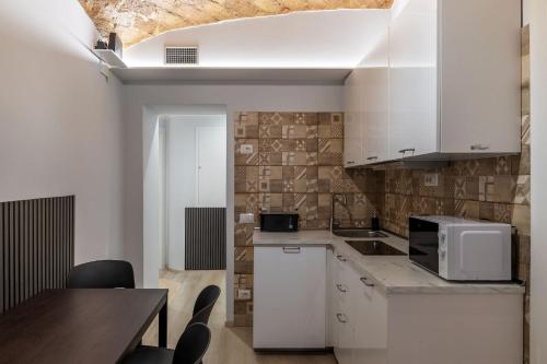 GuestHost - Alla Scala Santa Apartment