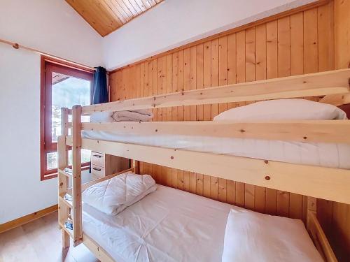 En eller flere senge i et værelse på Enchaple A5