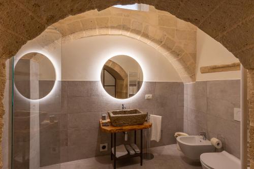 Phòng tắm tại L'Artiere Dimore nei Sassi