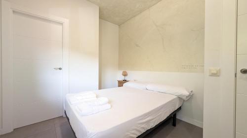 En eller flere senge i et værelse på La Estación entre viñedos