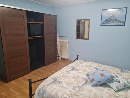 Postel nebo postele na pokoji v ubytování Appartamento Cascate delle Marmore