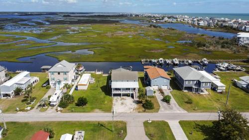 an aerial view of a house with a harbor at Dig'n It in West Onslow Beach