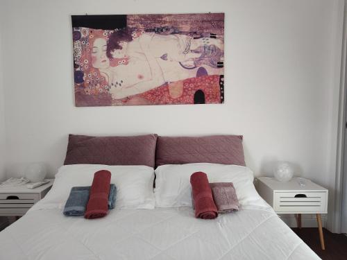 Postel nebo postele na pokoji v ubytování Chill out Home Fregene Family Group Accomodation - 15 minuti da Fiumicino - Casa Vacanza Fregene vicino al mare