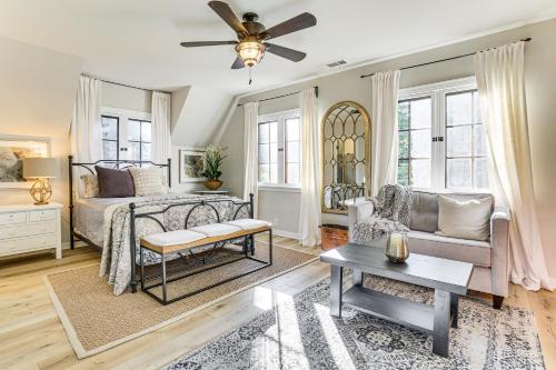 a bedroom with a bed and a couch at Steps to Lake Arrowhead Village Chic Apartment in Lake Arrowhead