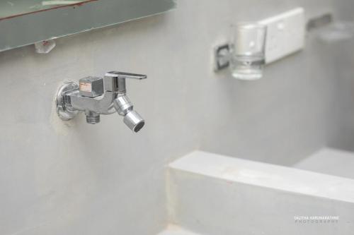 Et badeværelse på Amore Beach Resort