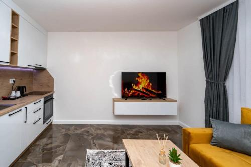 Η κουζίνα ή μικρή κουζίνα στο Apartmani Deluxe