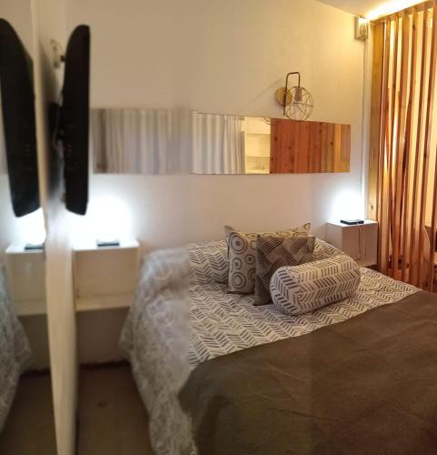 Ένα ή περισσότερα κρεβάτια σε δωμάτιο στο Departamento monoambiente amplio