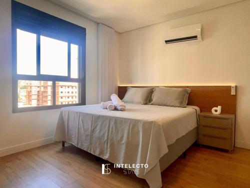 Ένα ή περισσότερα κρεβάτια σε δωμάτιο στο Infinity