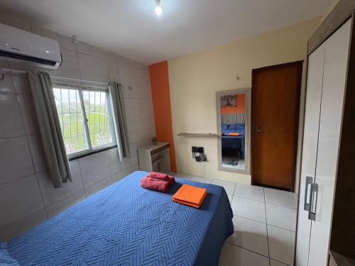 Ένα ή περισσότερα κρεβάτια σε δωμάτιο στο Apartamento completo e central! Casa Rute!