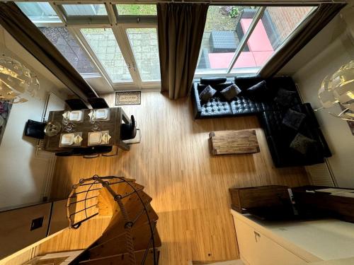 a view of a room with a camera on the wall at 3 bedrooms Family House till 6 p Near Amsterdam & Sea in Opmeer