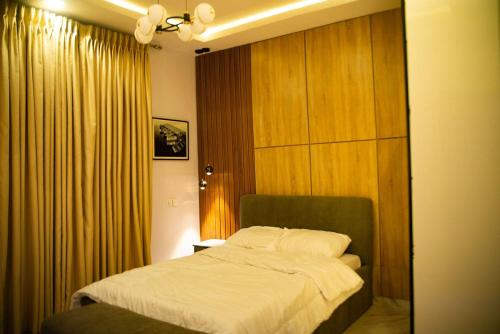 Giường trong phòng chung tại OTamazingapartment