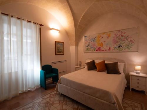 Ένα ή περισσότερα κρεβάτια σε δωμάτιο στο Residenza Kalù