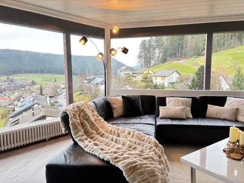 Posezení v ubytování Panorama Auszeit Schwarzwald Kamin Traumhaftes Premium Apartment