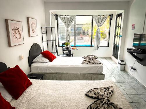 Galería fotográfica de Emma Hotel Jaco en Jacó