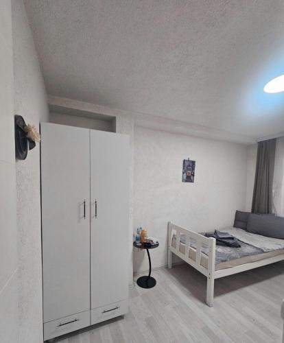 Postel nebo postele na pokoji v ubytování SARA TOUR APART Hostel