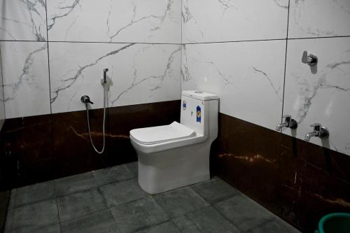 Koupelna v ubytování The Green Room Residency