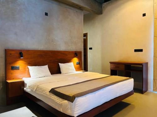 Ένα ή περισσότερα κρεβάτια σε δωμάτιο στο Liora Lodge Ella