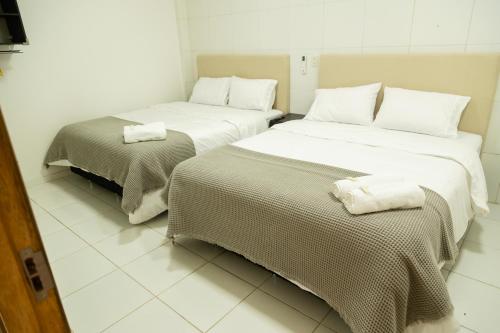 Postel nebo postele na pokoji v ubytování 2 habitaciones con baño privado y cocina equipada en el centro de Asunción