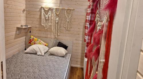 Ένα ή περισσότερα κρεβάτια σε δωμάτιο στο Bambolina