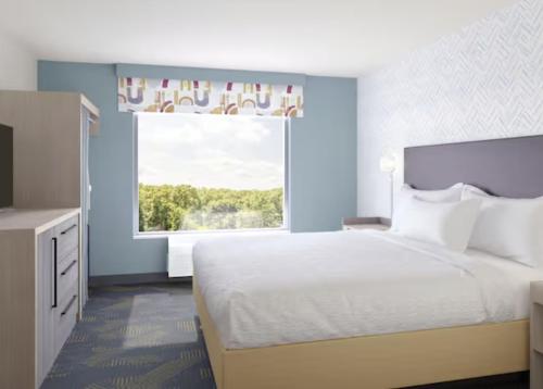 Ένα ή περισσότερα κρεβάτια σε δωμάτιο στο Home2 Suites By Hilton Winchester