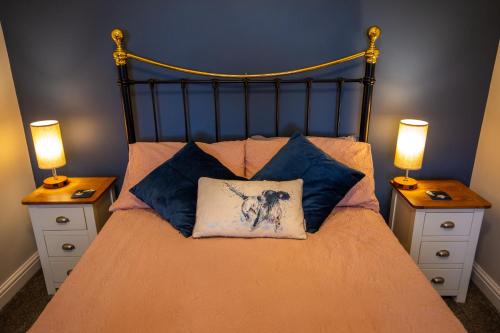 Ένα ή περισσότερα κρεβάτια σε δωμάτιο στο Penrhyllan