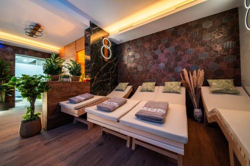 Ένα ή περισσότερα κρεβάτια σε δωμάτιο στο Hotel Zagi