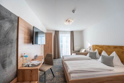 Ένα ή περισσότερα κρεβάτια σε δωμάτιο στο Hotel Solaria