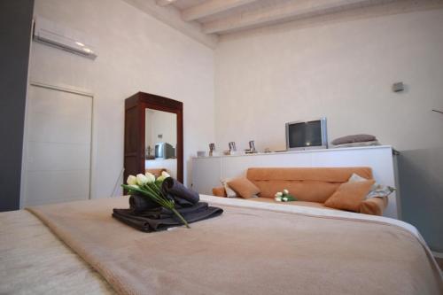 Ένα ή περισσότερα κρεβάτια σε δωμάτιο στο Relax garden villa 1ora da venezia