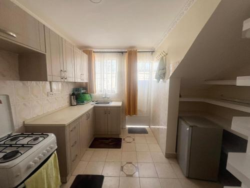 Η κουζίνα ή μικρή κουζίνα στο Cleo luxe villa