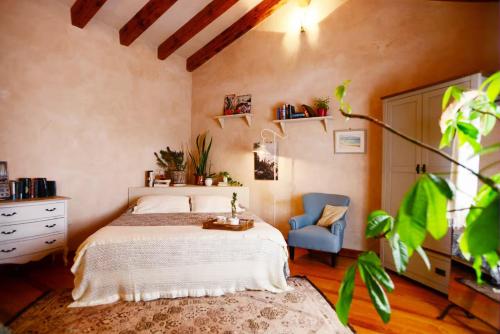 En eller flere senge i et værelse på Villa Olimpia