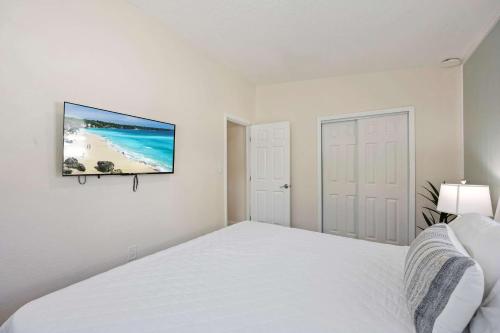 Postel nebo postele na pokoji v ubytování 637 S Orlando #8