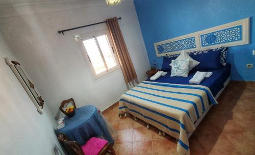 Ένα ή περισσότερα κρεβάτια σε δωμάτιο στο Ocean Hideaway - Sea View