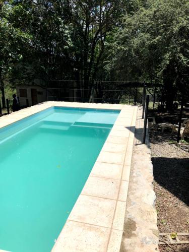 Swimmingpoolen hos eller tæt på Altos del Amanecer