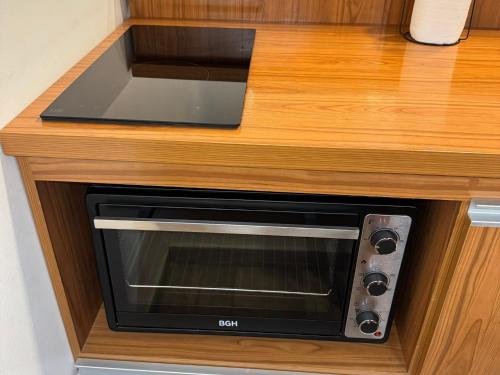 Η κουζίνα ή μικρή κουζίνα στο Apart's Sobremonte - Deptos Modernos