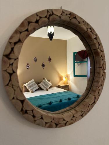 Postel nebo postele na pokoji v ubytování Dar Al-Andalus