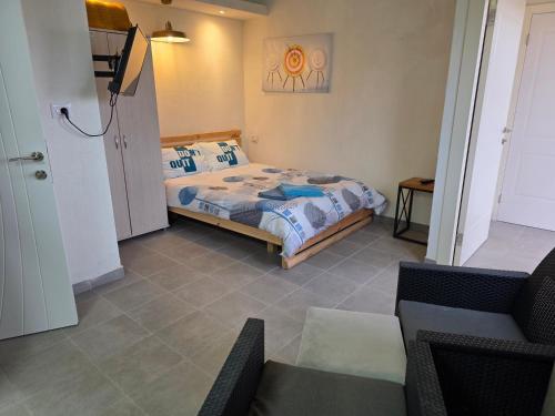 Postel nebo postele na pokoji v ubytování צימרים סוף העולם 2