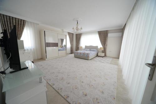 Postel nebo postele na pokoji v ubytování joseph villas