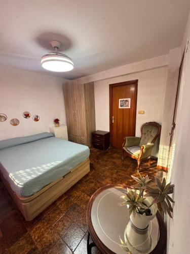 Ένα ή περισσότερα κρεβάτια σε δωμάτιο στο Apartamento 1