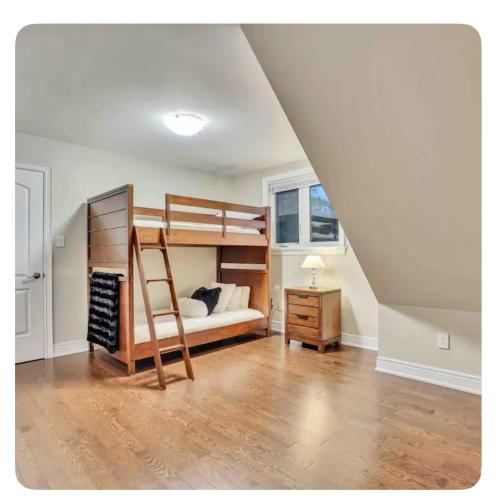 Ένα ή περισσότερα κρεβάτια σε δωμάτιο στο Riverside Dreams