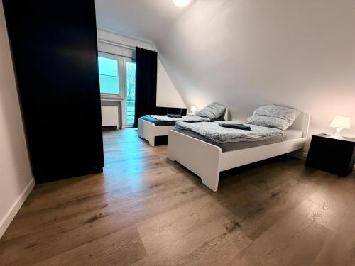 Ένα ή περισσότερα κρεβάτια σε δωμάτιο στο Apartment Am Hang II Natur & Ruhe