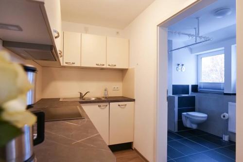 Et badeværelse på Wunderschöne große Ferienwohnung in Aue